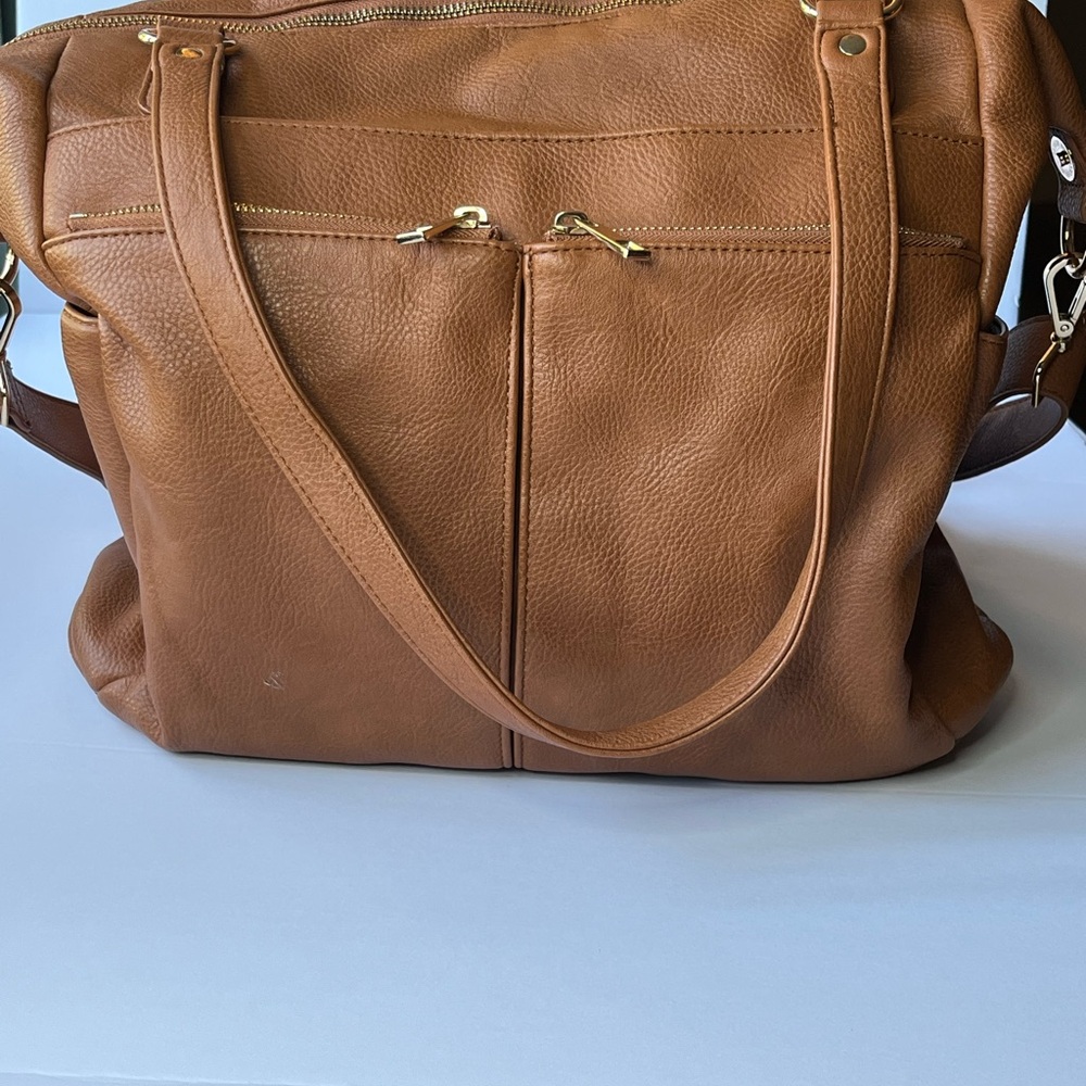 Tan and gold diaper bag